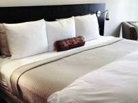 bigstock_Bedroom_With_Comfortable_Bed_3118184